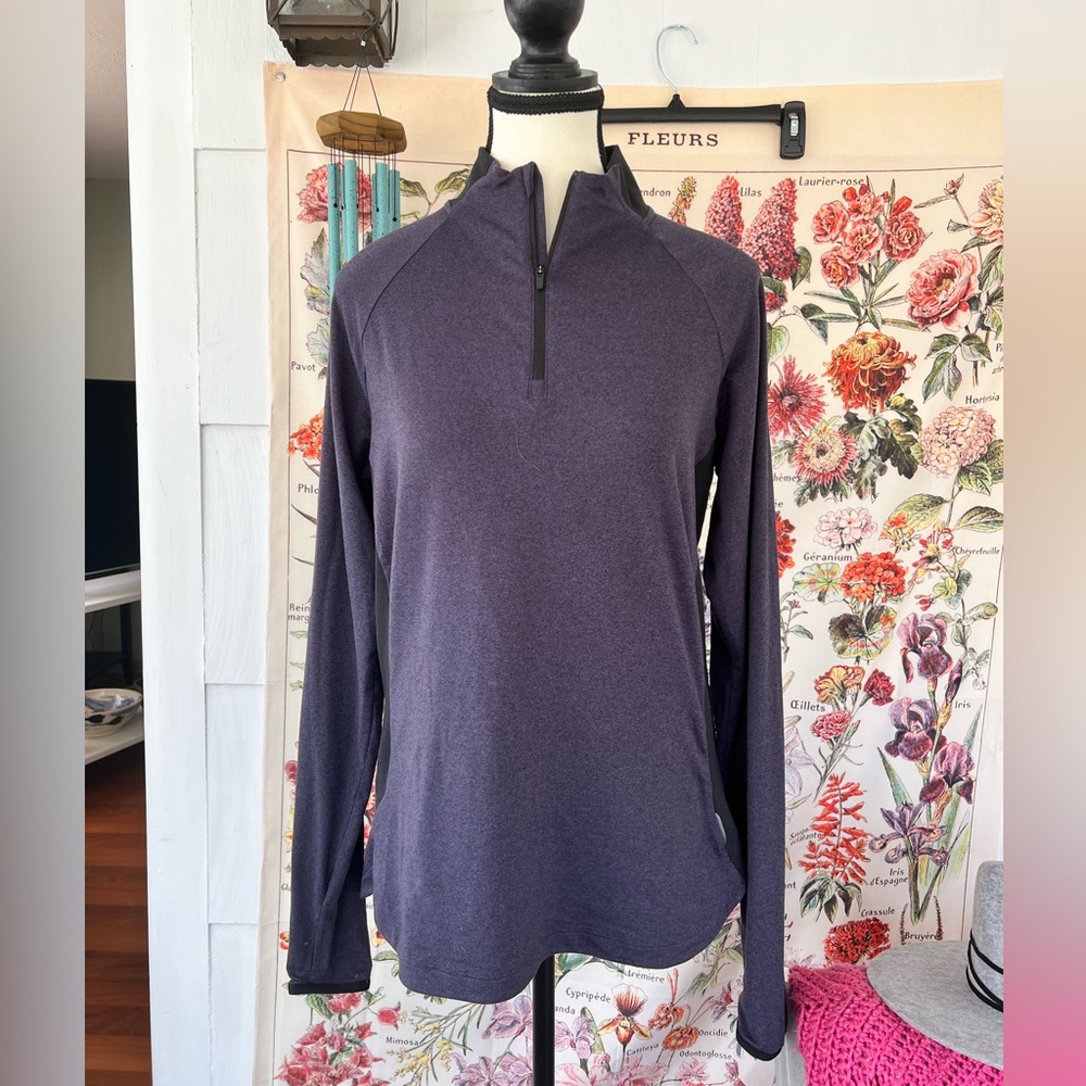 REI co-op shell. 1/4 zip front, thumb holes, side pocket with zip side L
